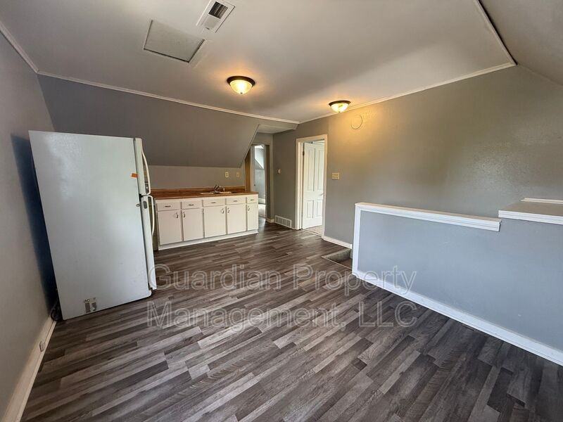 E 3rd St - Photo 4 of 11