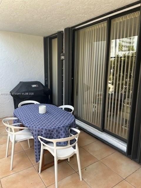 425 Grapetree Dr #209 - Photo 6 of 6