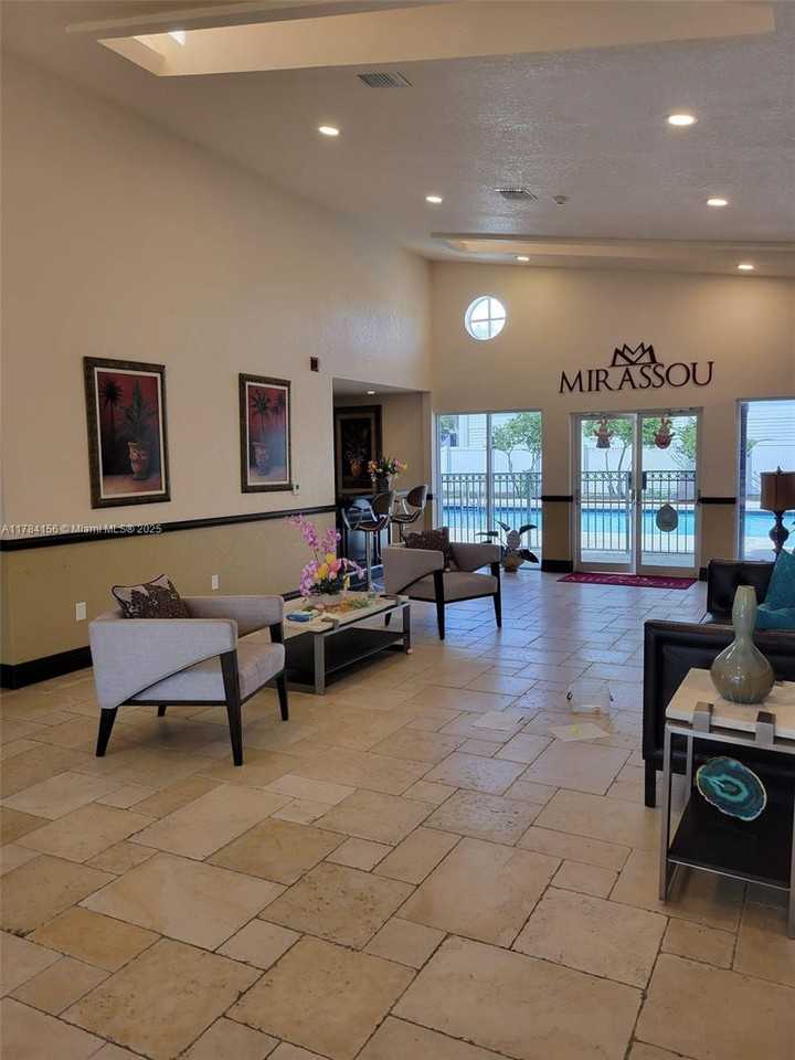 6045 Nw 186th St #101 - Photo 2 of 8