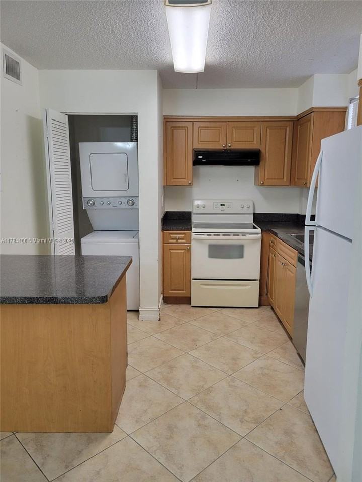 6045 Nw 186th St #101 - Photo 3 of 8