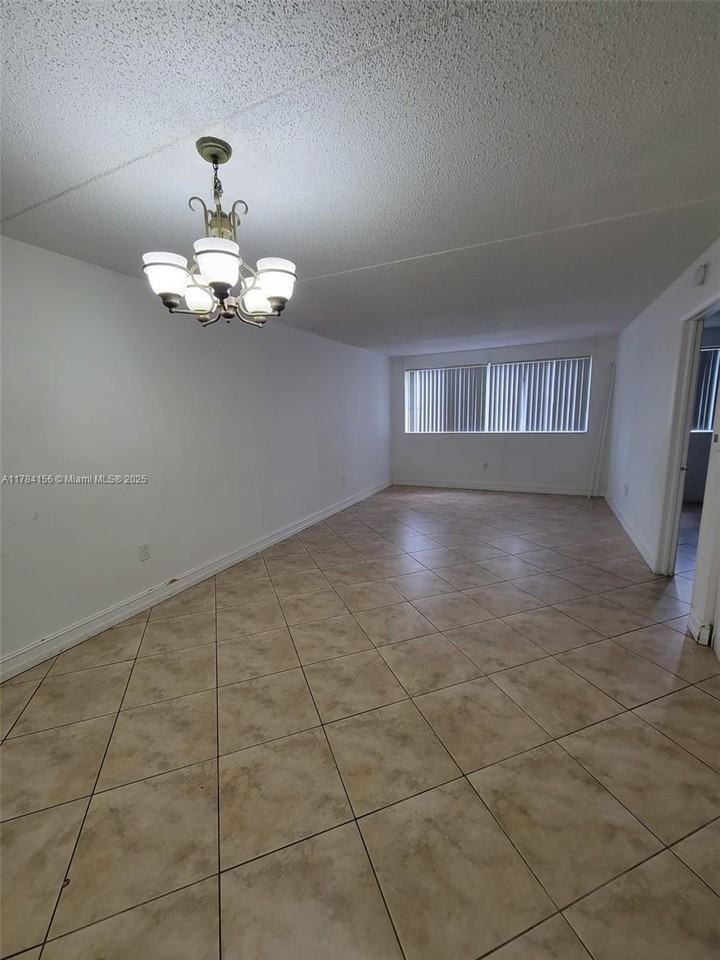 6045 Nw 186th St #101 - Photo 6 of 8