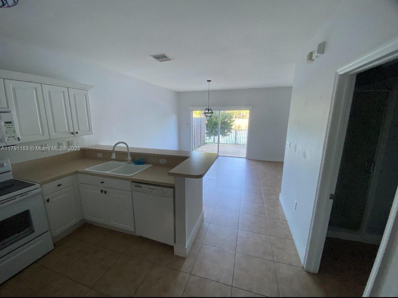 9283 Southwest 219th Street - Photo 2 of 8