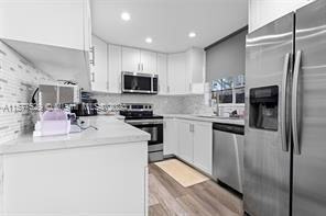 9731 Nw 37th St - Photo 4 of 8