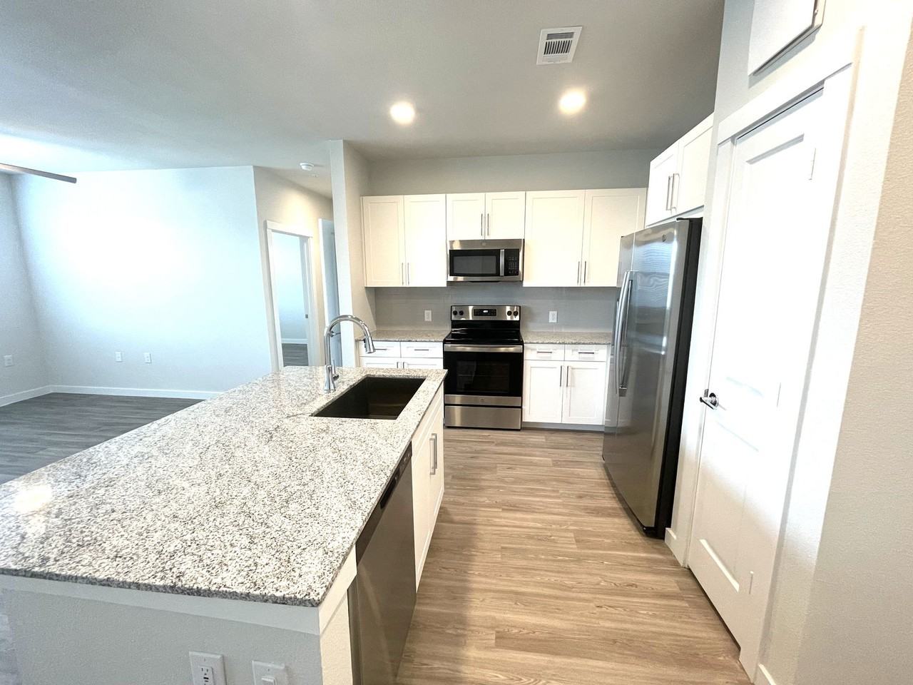 11925 Ring Dr #11-101 - Photo 3 of 8