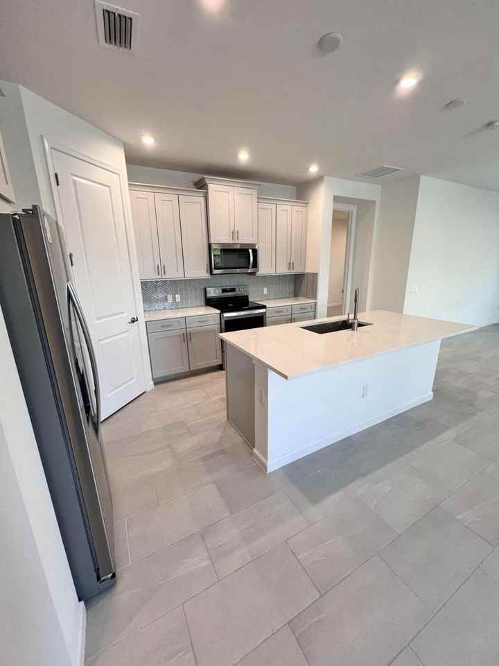 Pointe Of Woods Dr - Photo 2 of 8