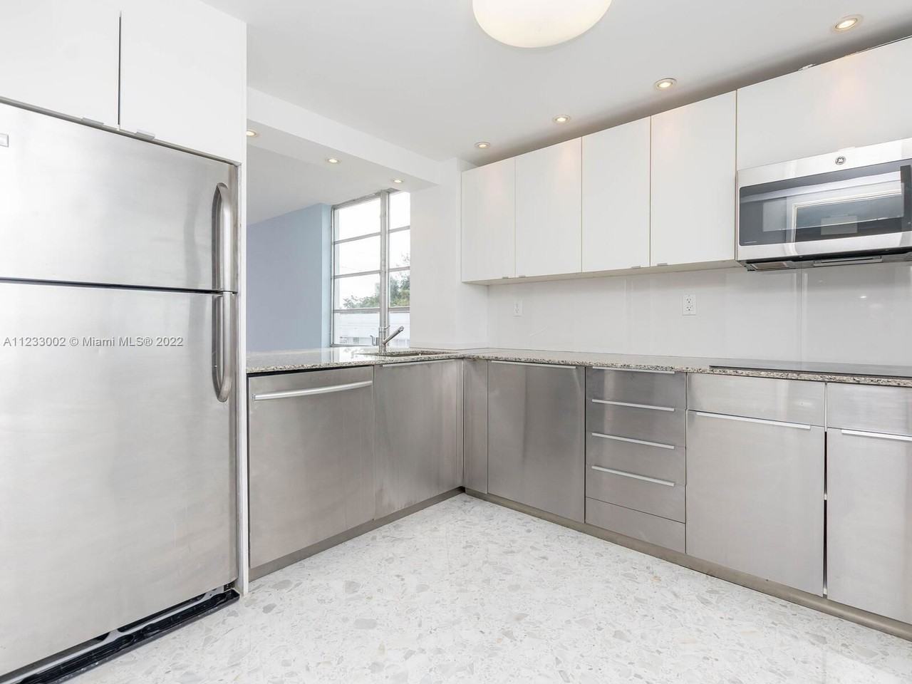 8000 Harding Ave - Photo 2 of 4
