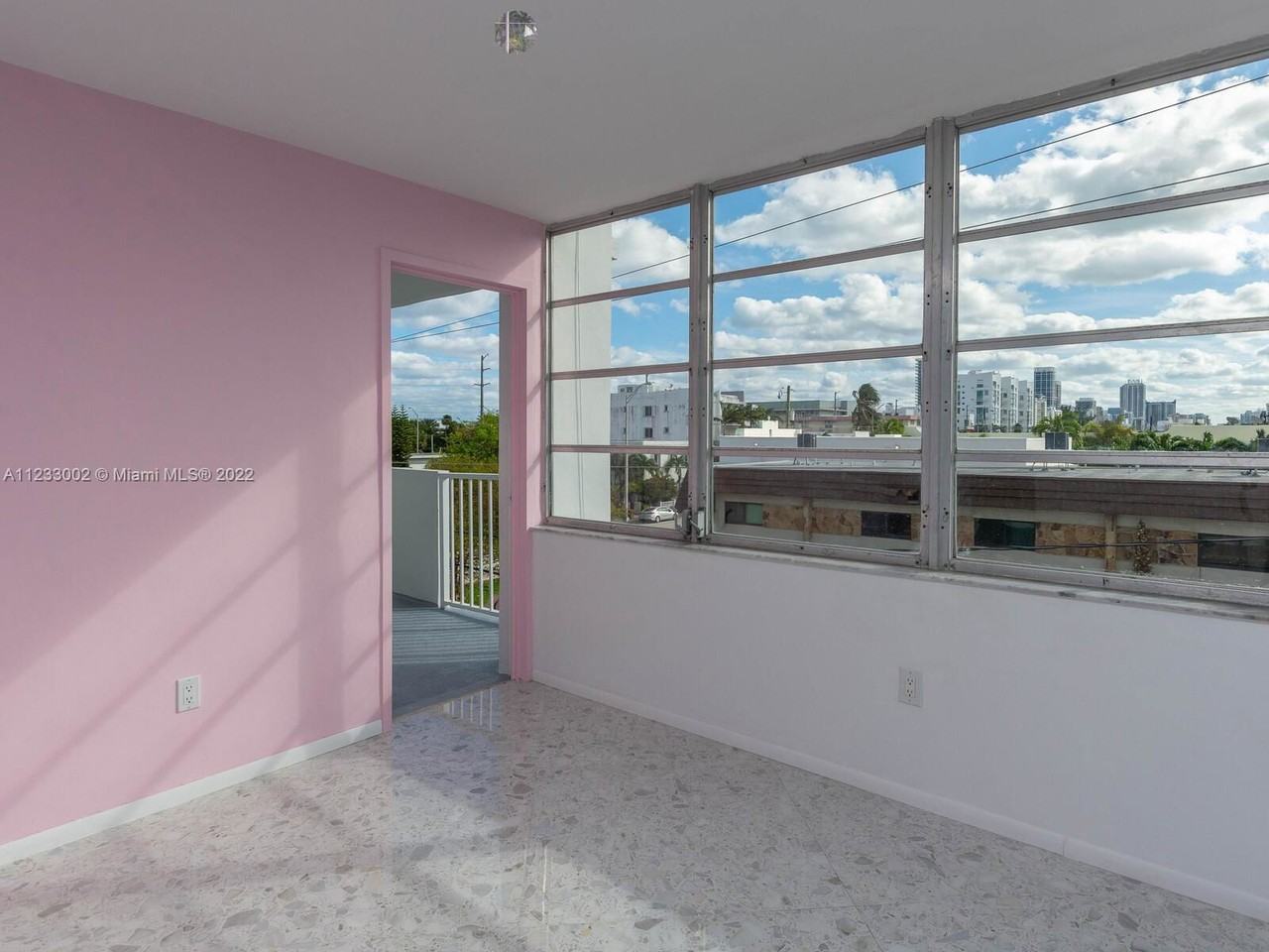 8000 Harding Ave - Photo 3 of 4