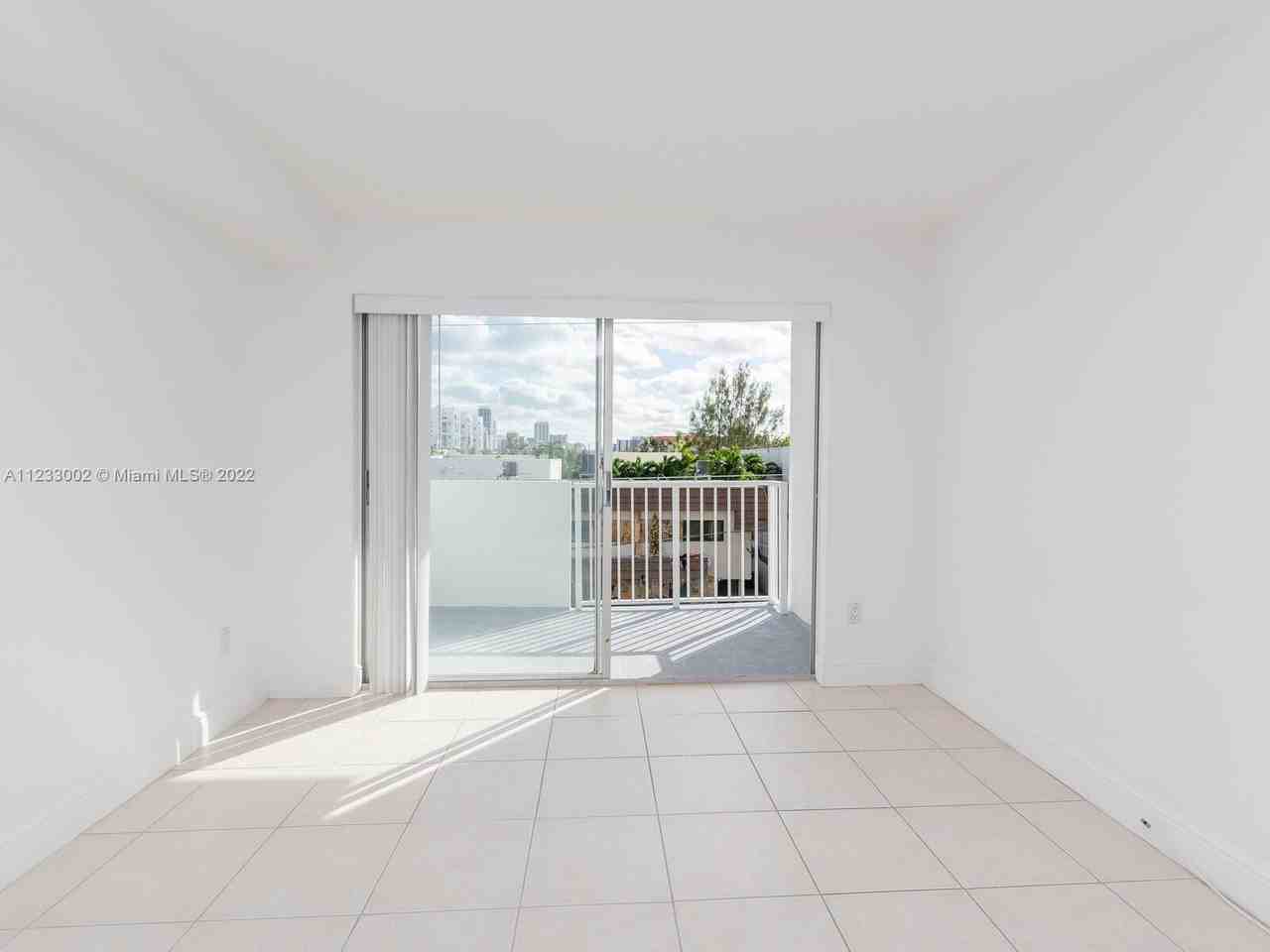 8000 Harding Ave - Photo 4 of 4