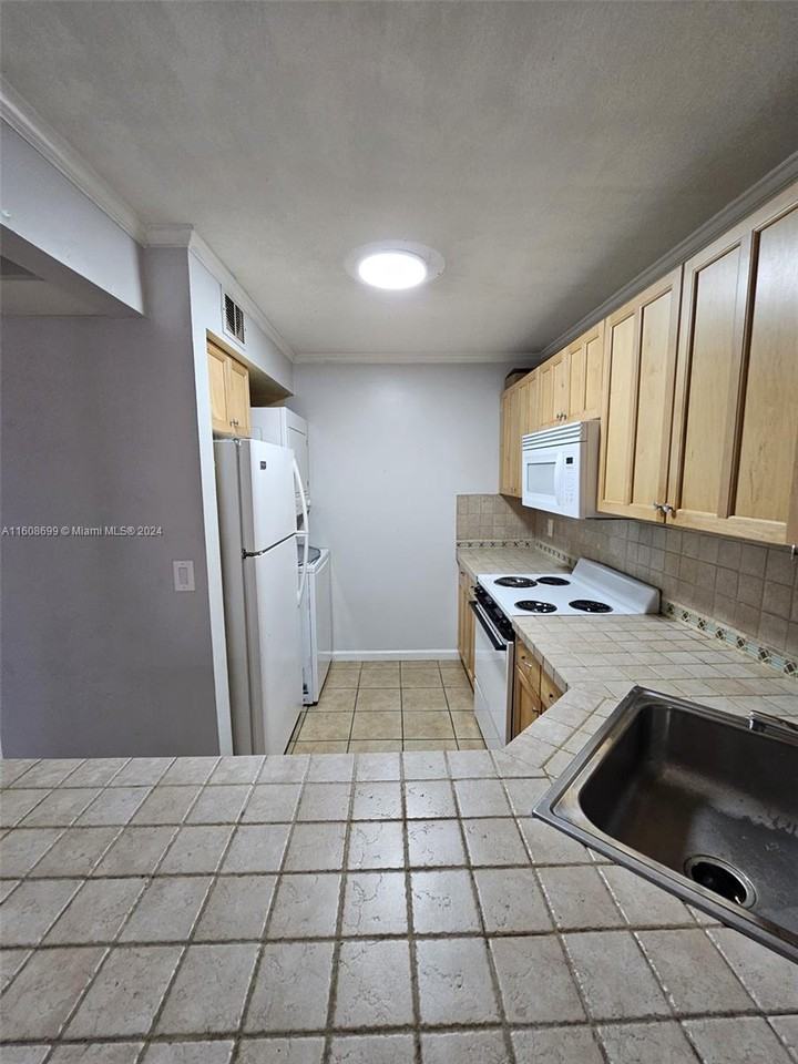 10002 Winding Lake Rd #101 - Photo 3 of 8