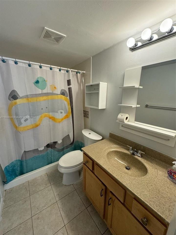 10002 Winding Lake Rd #101 - Photo 7 of 8