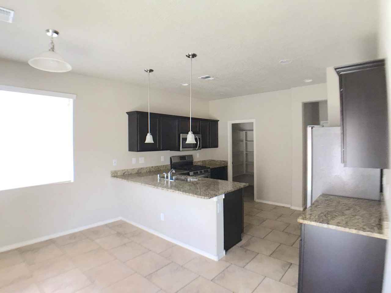 3916 Dynamite Rd Ne - Photo 2 of 16