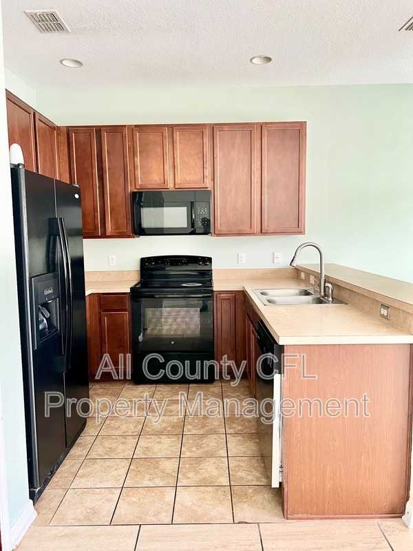 12137 Citruswood Dr - Photo 4 of 32