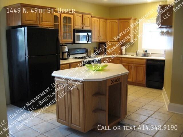 1449 N 49th St Uppr - Photo 2 of 7