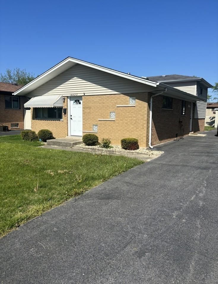 14423 Tripp Ave - Photo 2 of 3