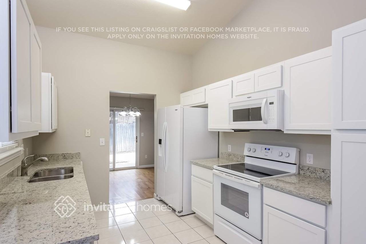 2125 S Elkhart St - Photo 6 of 15