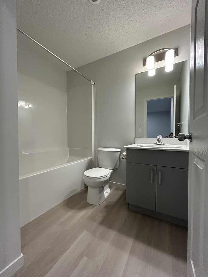 Bright 3 Bedroom 2.5 Bathroom Main Floor Unit*Double Garage Available! - Photo 3 of 40