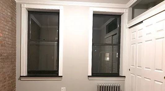 E 10th St #2B - Photo 4 of 6