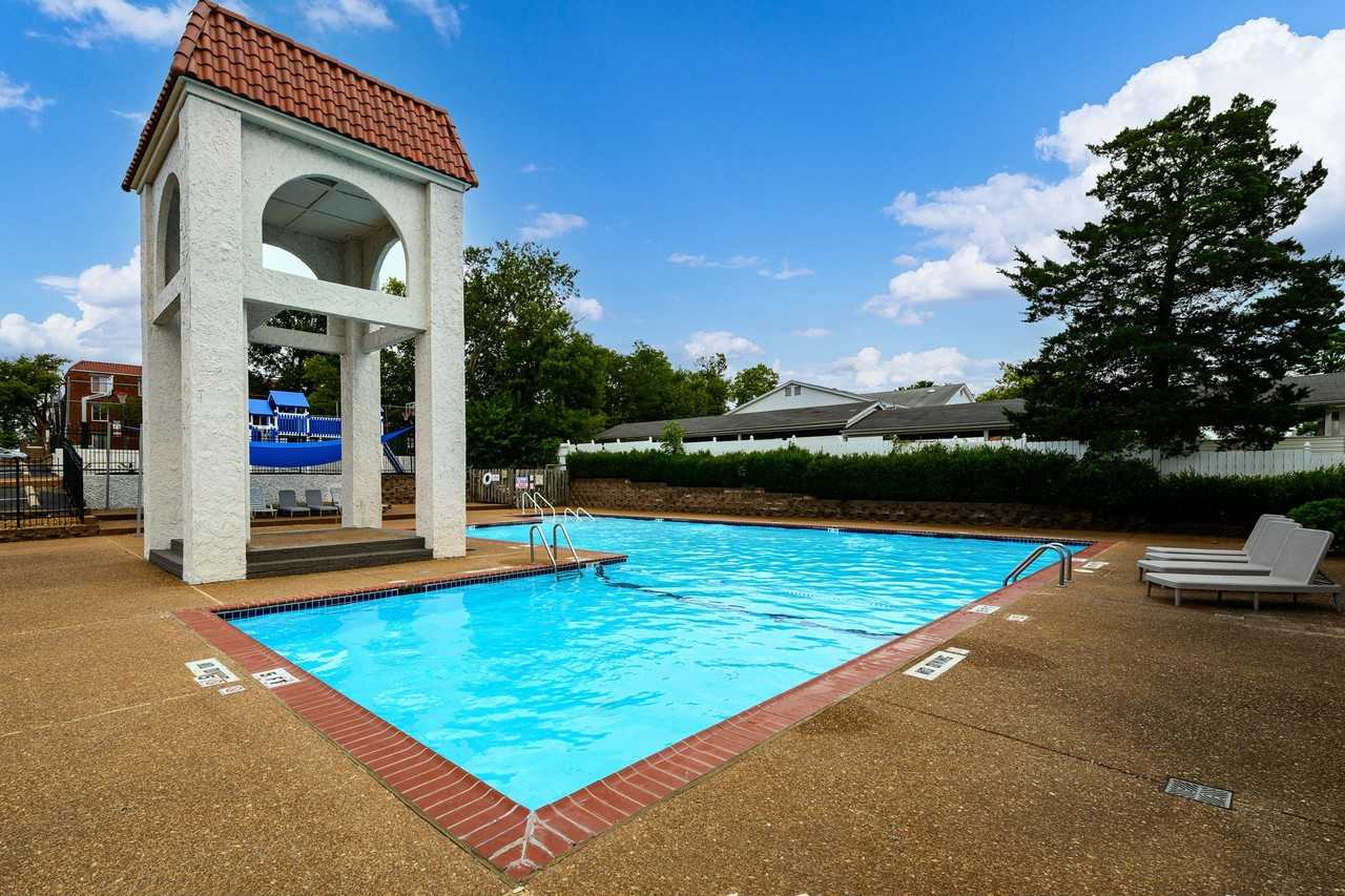 THE OAKS APARTMENTS - Photo 2 of 50