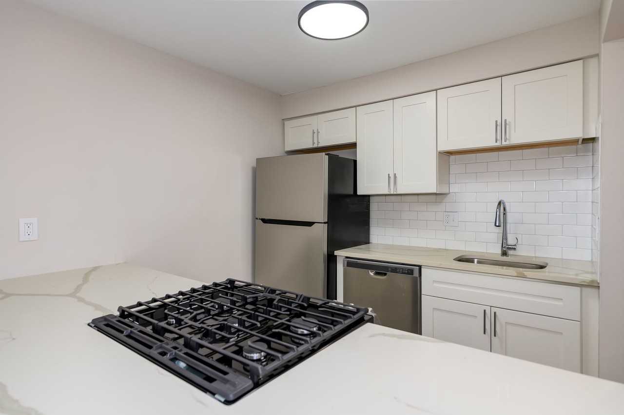 THE OAKS APARTMENTS - Photo 7 of 50