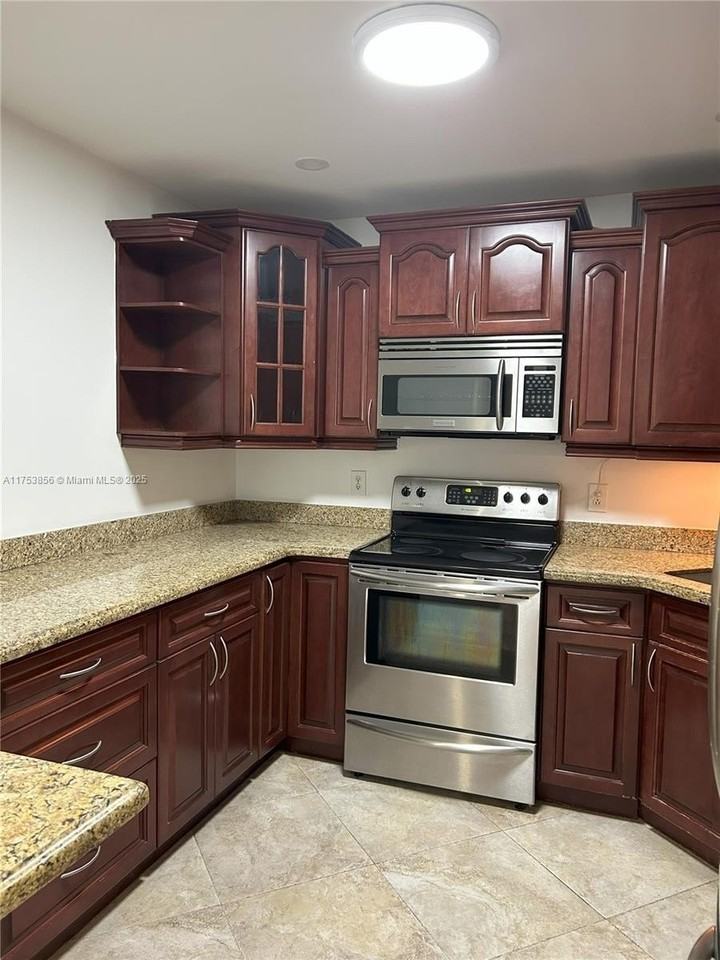 3299 Cocoplum Circle #3324 - Photo 3 of 50