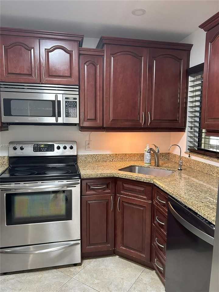 3299 Cocoplum Circle #3324 - Photo 4 of 50