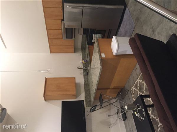 Plaza Lofts Apartment - Photo 2 of 7