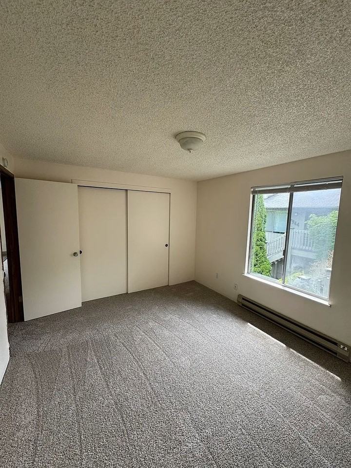 #133 WOODMONT APARTMENTS - Photo 7 of 32