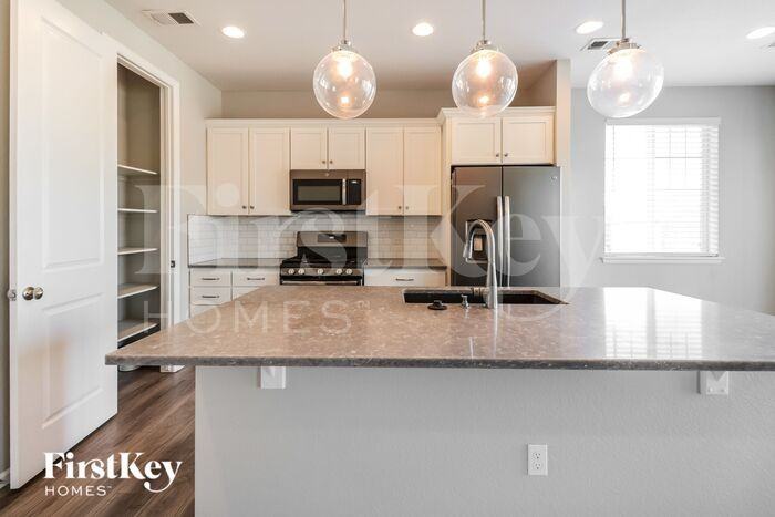 21033 E Tufts Ave - Photo 3 of 6