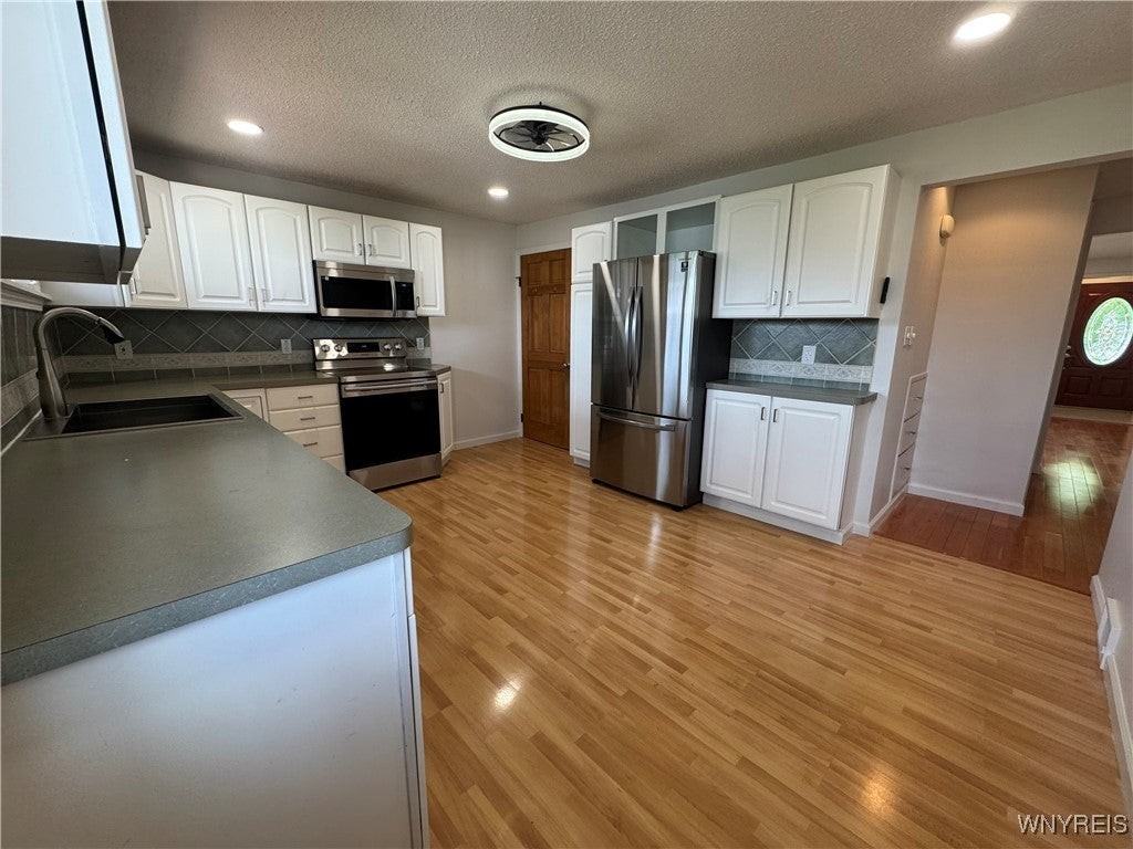 165 Carmen Rd - Photo 7 of 31