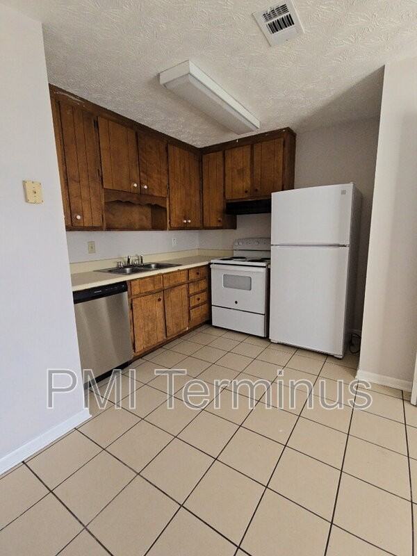 5227 Ridge Forest Dr - Photo 2 of 26