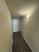 The Apartments at Charles Plaza - Photo 1 of 1