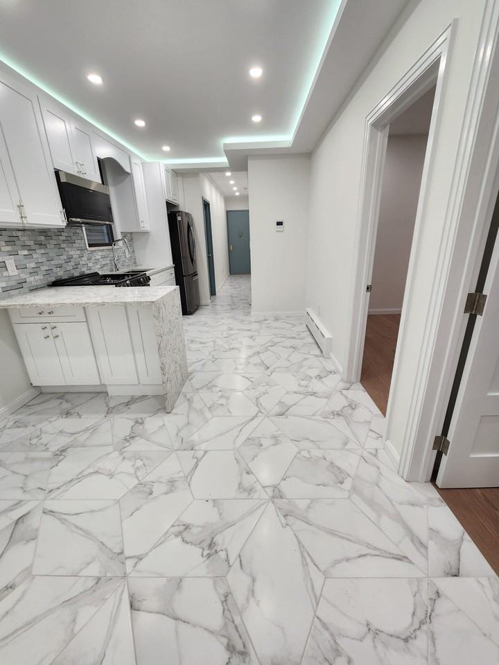 10239 46th Ave #1stFL - Photo 2 of 14