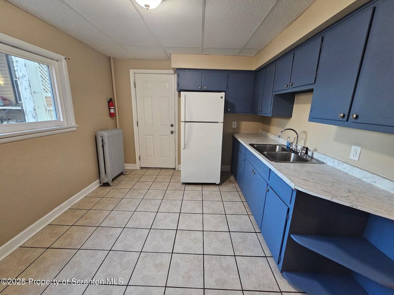 1218 S Main Ave - Photo 3 of 14