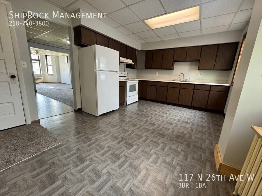 117 N 26th Ave W - Photo 3 of 15