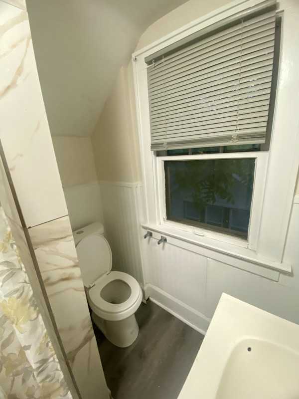 1102 Neptune Ave - Photo 4 of 13