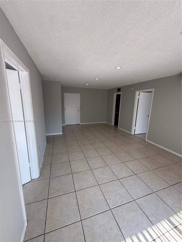 4705 Nw 7th St #203-7 - Photo 2 of 12