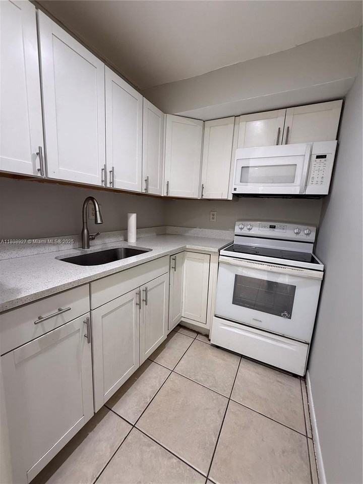 4705 Nw 7th St #203-7 - Photo 5 of 12