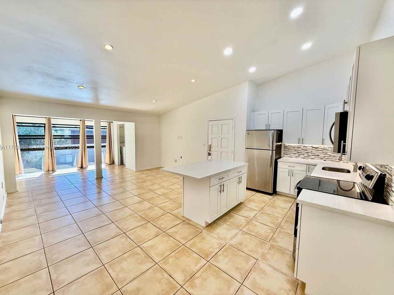 4970 Nw 102nd Ave - Photo 3 of 8