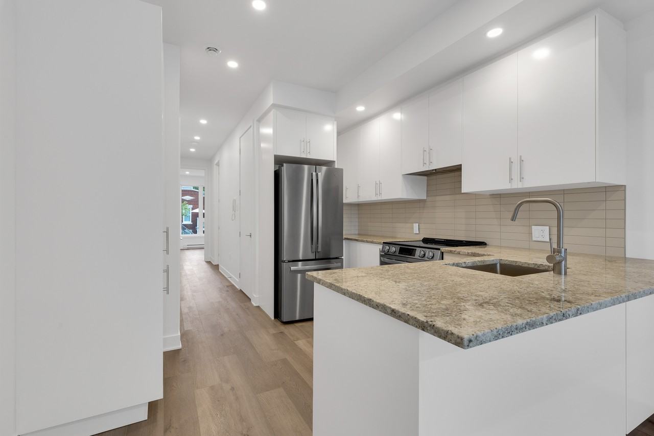 6892 Rue de la Roche #A - Photo 3 of 15