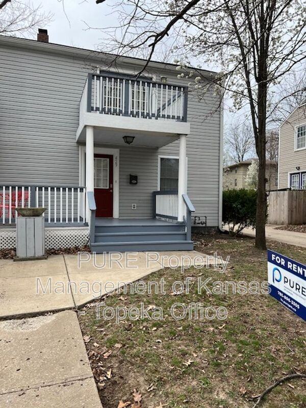 429 E 63rd Ter - Photo 2 of 40