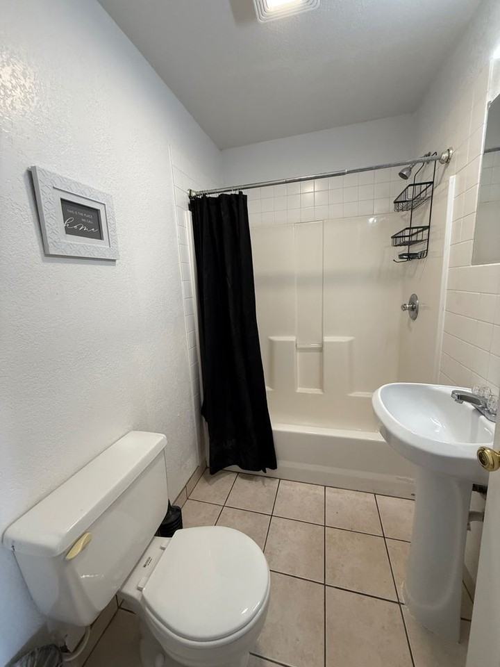 Clean, updated unit with utilities included - Photo 6 of 10