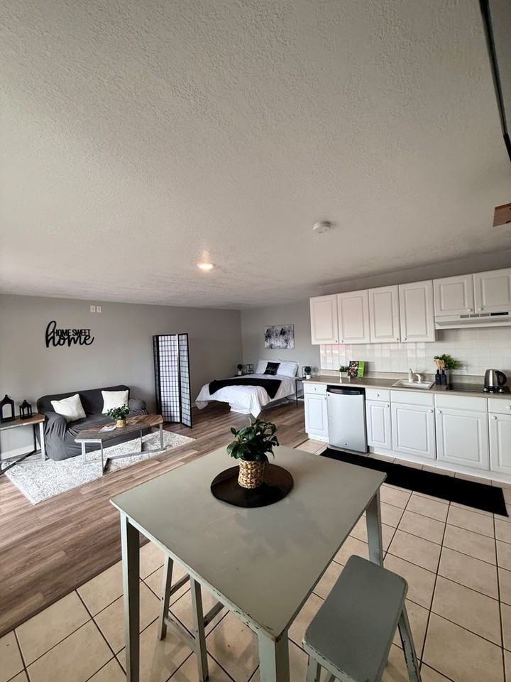 Clean, updated unit with utilities included - Photo 7 of 10