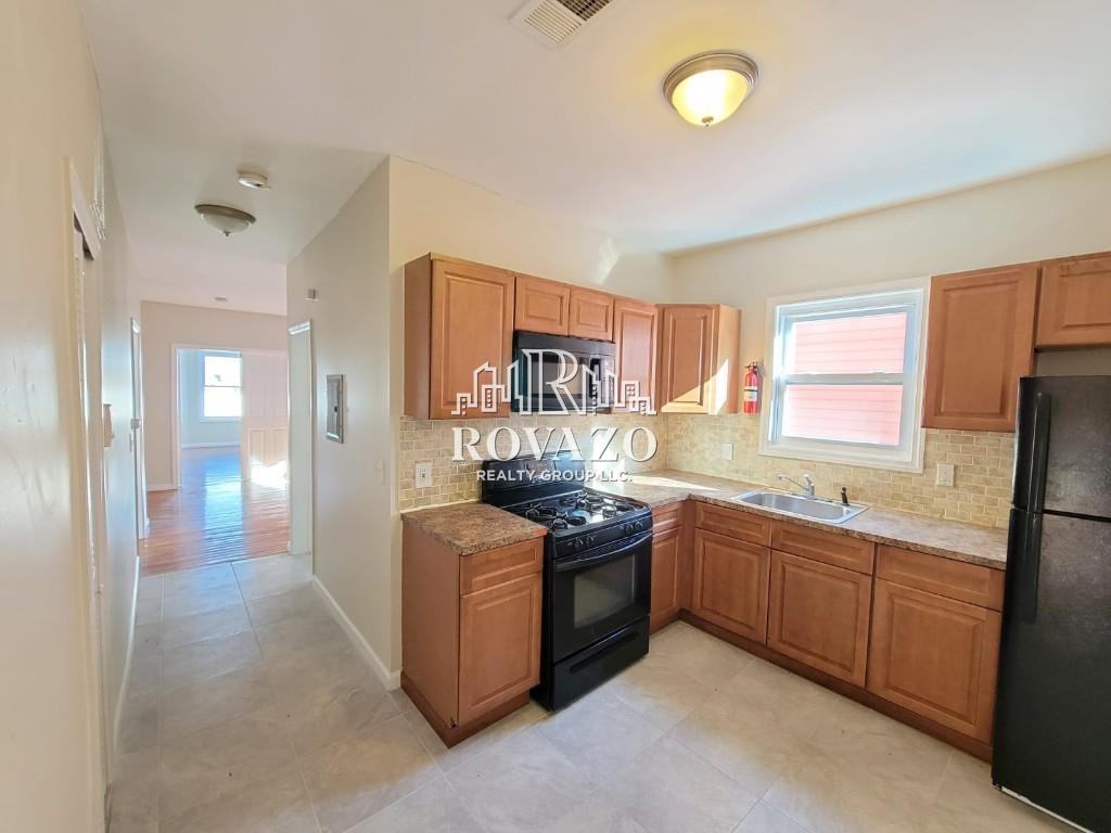 94 11th Ave W #3 - Photo 2 of 8