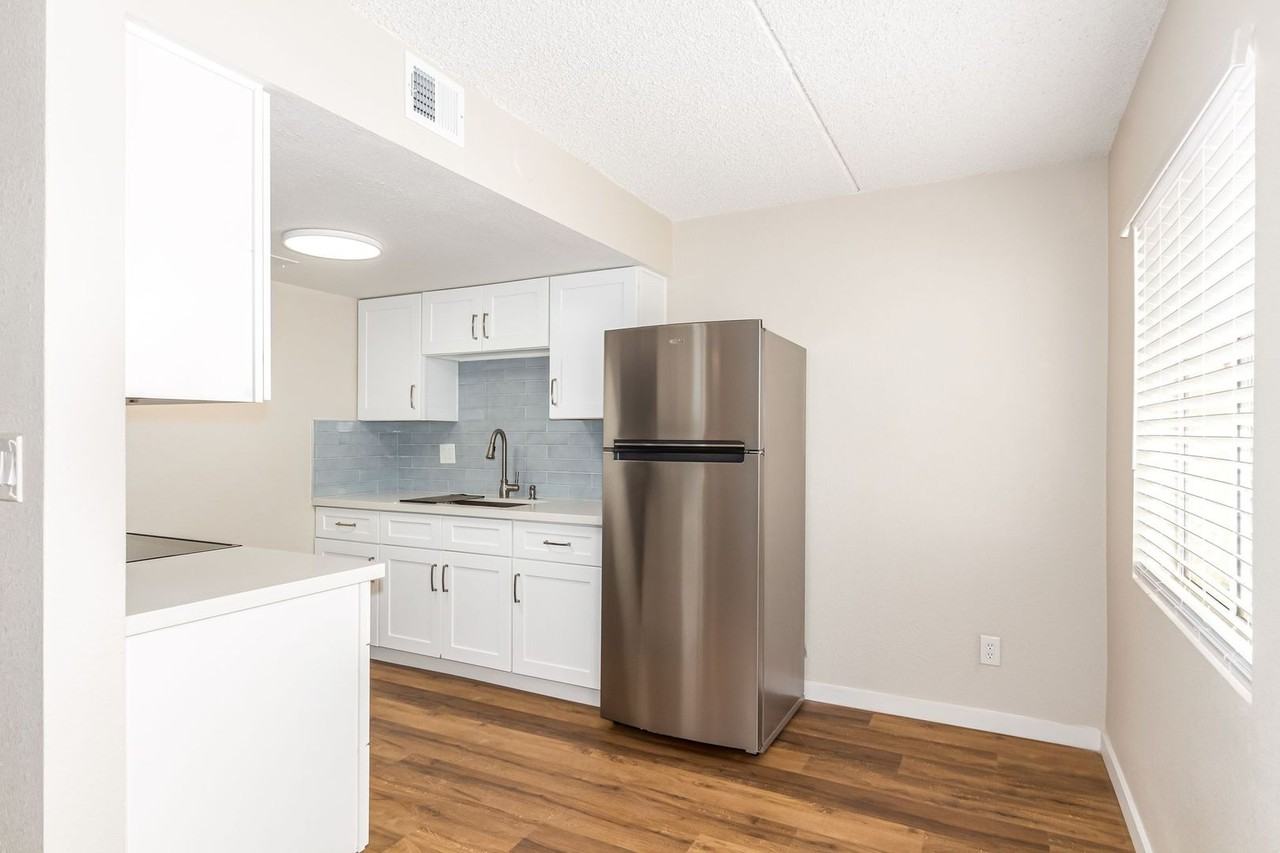 Venture On 12th Place - Photo 4 of 27