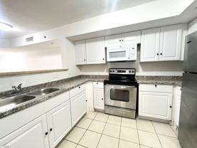 Welcome to Your Ideal Home in North Miami's Gated Community - Photo 1 of 1