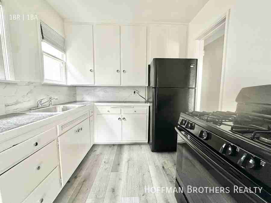 6857 Willoughby Ave #1 - Photo 3 of 16