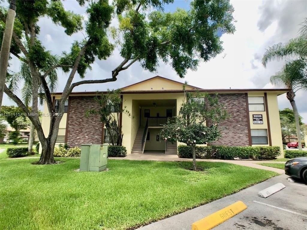 10026 Winding Lake Rd #102 - Photo 2 of 18