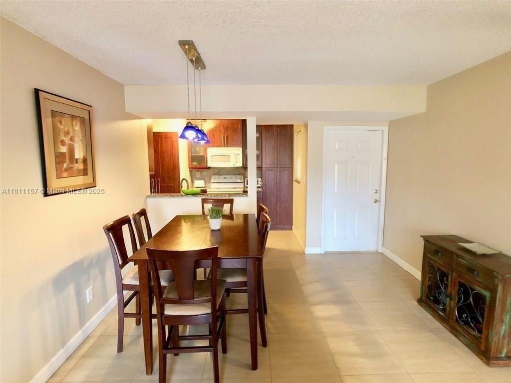 10026 Winding Lake Rd #102 - Photo 4 of 18