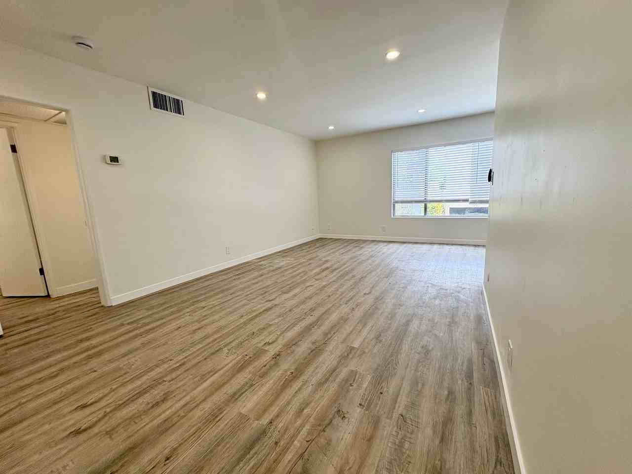 Peerless Apartments - Photo 3 of 50