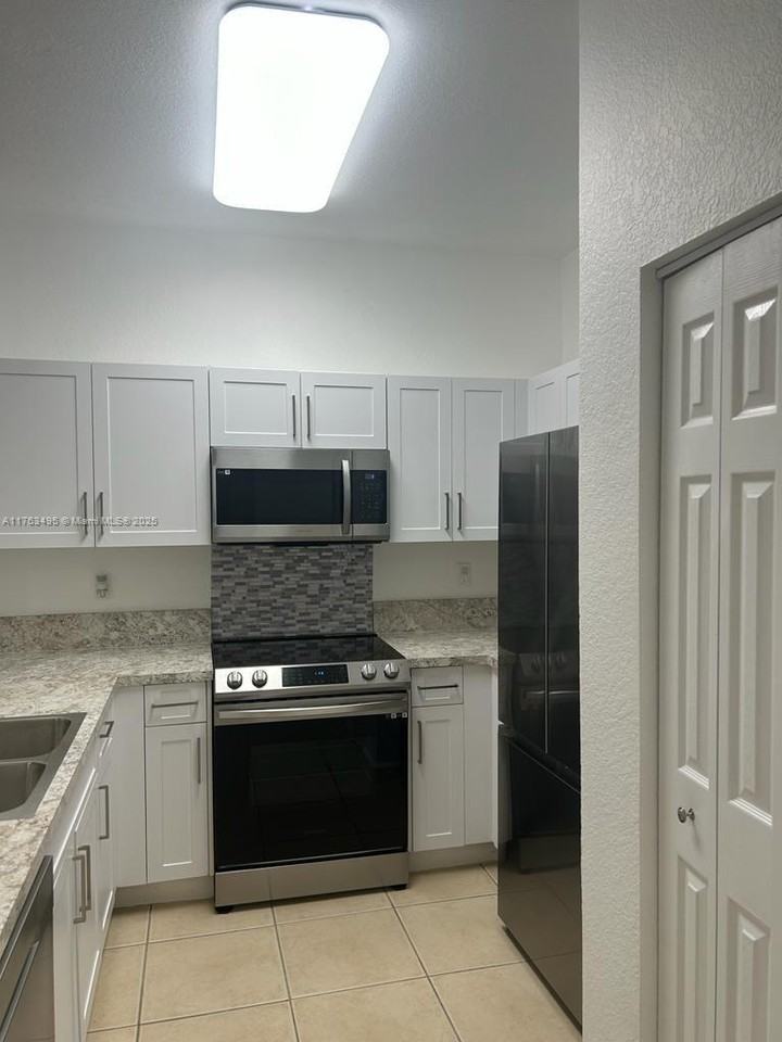 9257 Sw 227th St - Photo 6 of 8